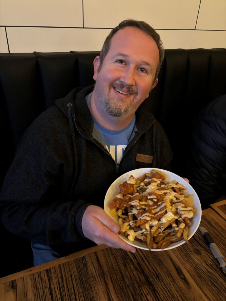 Case jumped in and tried the famous Canadian Poutine